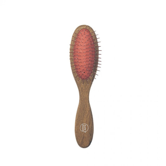 Petite brosse rigide très démêlante